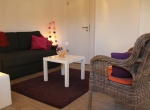 L’espace de consultation avec canapé et fauteuils